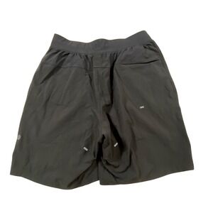 Lululemon Mens Black Athletic Running Shorts Size S Zipper Pockets Reflective
